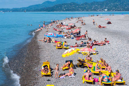 Batumi, Georgia - June 6, 2016: people relax at Batumi City Beach.のeditorial素材