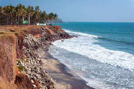 Varkala, Kerala, India. Steep coast, palm trees and sea horizon. 2 km away from the Central Beach.の写真素材