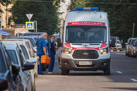 Saint Petersburg, Russia - July 10, 2021: a resuscitation ambulance with the staff in the street.のeditorial素材