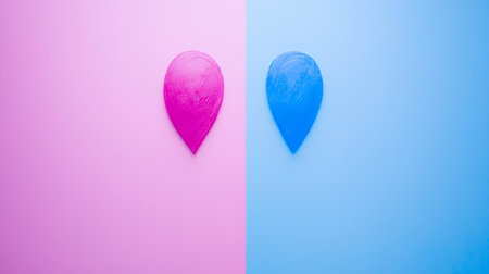 A vibrant pink and a bright blue textured teardrop shape, each featuring a distinct brushstroke-like surface.の素材