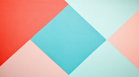 A textured wall featuring a geometric design with coral, turquoise, light blue, and pastel pink triangles forming a diamond pattern.の素材