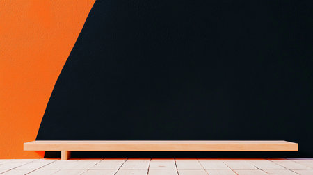 A textured wall featuring a bold orange and black color block design, complemented by a light wooden shelf for display or product placement.の素材