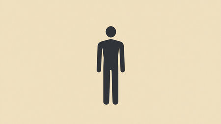 A dark gray, simplified human figure icon stands upright, featuring a circular head, rectangular body, and straight arms and legs.の素材