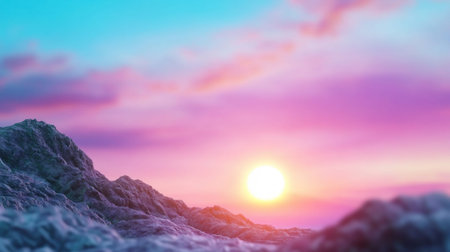 A stunning landscape featuring a colorful sunset over a range of mountains. The sky is filled with hues of pink, purple, and blue.の素材