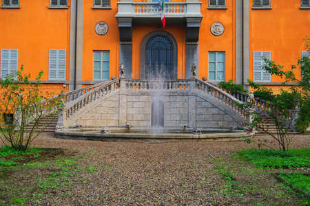 Beautiful view of the fountain and the staircase entrance of a palace in Pavia, Italyのeditorial素材