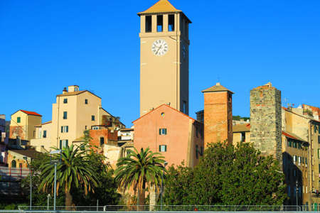 Glimpse of Savona, Italy, is visible in the center of the shot, the tower Brandale XII century flanked by other towers.の写真素材