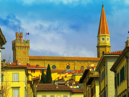 Panorama of the city of Arezzo, Italy, on the left you can see the tower of the town hall, on the right stands out the tall bell tower of the cathedral.のeditorial素材
