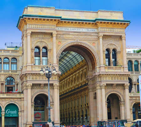 Milan, Italy, 19 june 2016.Entrance gallery Vittorio Emanuele II seen from the Piazza Duomo in Milan, Italy. The Vittorio Emanuele II Gallery in Milan is a shopping arcade, in the form of covered pedestrian street connects Piazza Duomo to Piazza della Scaのeditorial素材