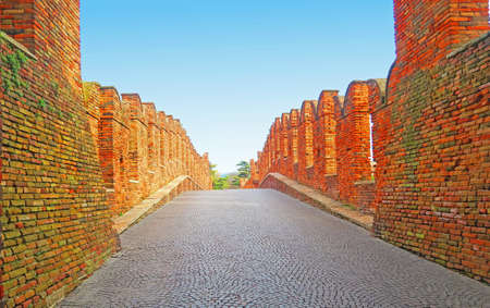 Verona,Italy,12 march 2017. The Castel Vecchio Bridge or Scaliger Bridge is a fortified bridge in Verona,over the Adige River.It was built most likely in 1354-1356 by Cangrande II della Scalaのeditorial素材