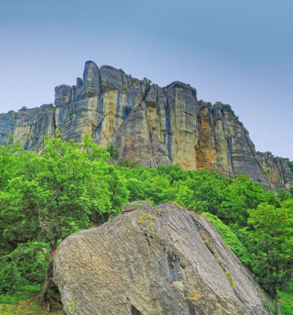The Pietra di Bismantova is a characteristic mountain of the Apennines,Italy,1041 meters high.It is located in the province of Reggio Emilia.It looks like a narrow plateau with steep walls, which stands isolated in the Apennine mountains.It is included in the territory of the Tuscan-Emilian Apennine National Park.の写真素材