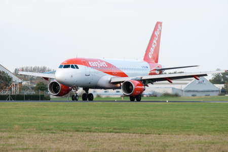 Southend, UK - 21 October 2017: Easyjet A319-111 (E-EZGC) lands at London Southend airport (EGMC)のeditorial素材