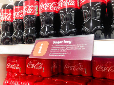 Southend, England - 29 April 2018: Sign showing the goverments sugar tax levy, introduced on 6 April 2018.のeditorial素材