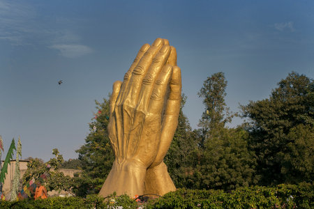 16-Jan-2017 giant replica of Yogiji Maharaj's hands at traffic island near Shree Swaminarayan Mandir now-Swaminarayan Chowk ' Shahi baug Ahmedabad Amdavad Gujarat INDI asiaのeditorial素材