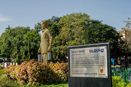 08 Jun 2017 Dabbawala statue in Haji Ali Mumbai Maharashtra INDIA