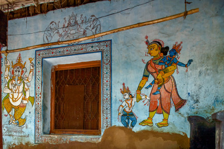5-Jul-2007-Ganesh Krishna and Balram Mother Jasoda in traditional wall painting outside ruler house Raghurajpur-Orissa INDIAのeditorial素材
