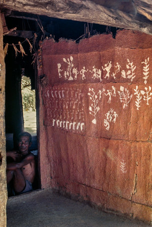 03 Jan 2017 warli painting on mud waal on Tribal hut. Warli tribe, Dahanu Maharashtra. Indiaのeditorial素材