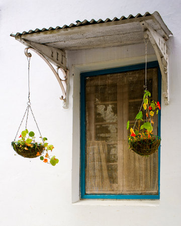 26 Sep 2009 Vintage Beautiful Metal window Canopy and flower pot Old colonial House Nainital Uttarakhand Indiaのeditorial素材