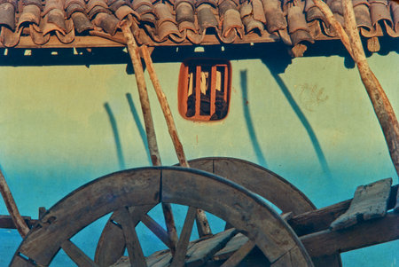 20 Oct 2020 Vintage old Village house with india clay fertile and part of wooden cart wheel outside of Bhopa Madhya Pradesh Indiaのeditorial素材