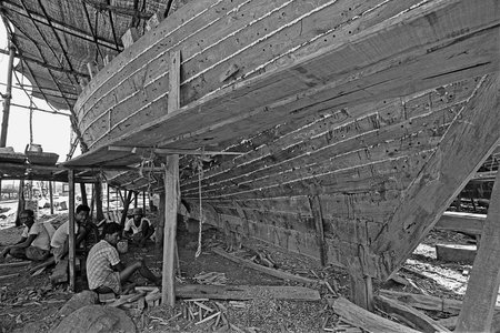 Unidentified Worker pulling Boat with Thick rope near Pen Panvel konkan Maharashtra india