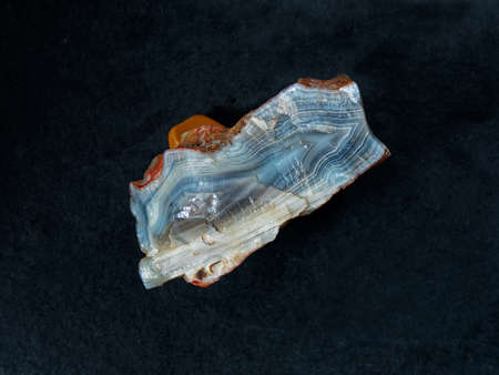 Rock of heulandite mineral from India isolated on a pure black background Kalyan Maharashtra India
