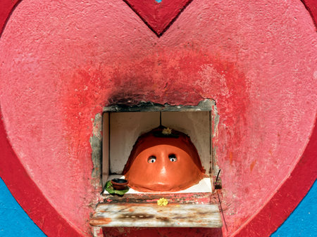 04 10 2022 Vintage Way side Hanuman Shrine on a wall at Old Part of Pune Heritage Walk Pune Maharashtra India.のeditorial素材