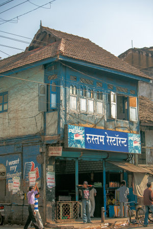 01 14 2007 Vintage Wooden Frame Old House and Mild Steel Grill work Pune Maharashtra India.のeditorial素材