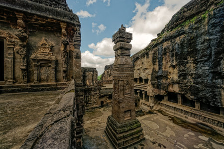 08 18 2006 The Stone Pillar at the Kailashanatha Temple Cave 16 One side of the courtyard,Elora near Aurangabad Maharashtra India.のeditorial素材