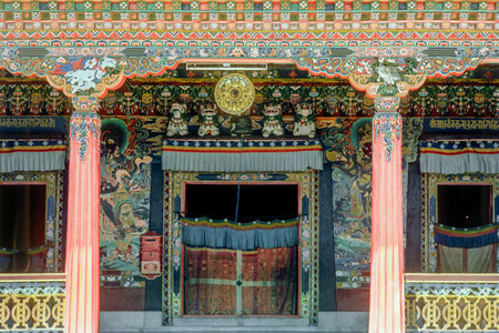 Paintings and decorated door at the Rumtek Monastery, Rumtek Sikkim, Indiaのeditorial素材