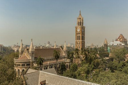 04 29 2011 Vintage Old Rajabai Clock Tower from Watson Hotel now Esplanade Mansions at Kala Ghoda Mumbai Maharashtra Indiaのeditorial素材