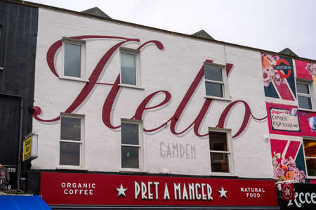 LONDON - SEPTEMBER 30, 2019: Graphic artwork on side of building above coffee shop on Camden High Streetのeditorial素材