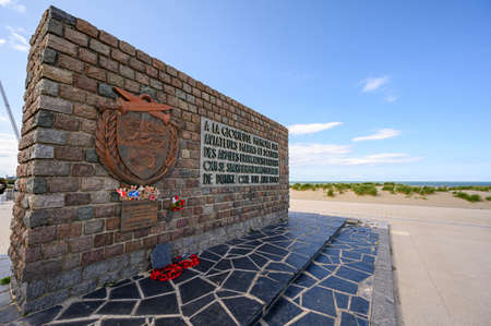 DUNKIRK, FRANCE - AUGUST 13, 2019: The Operation Dynamo Memorial to Allied Forces in Dunkirk with sand dunes to the sideのeditorial素材