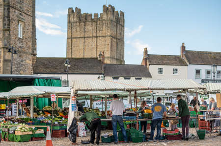 Richmond, North Yorkshire, UK - August 1, 2020: An outdoor market with Richmond Castle in the backgroundのeditorial素材