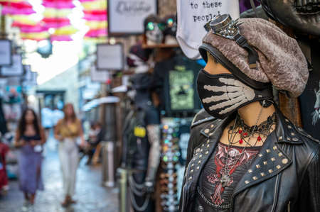 LONDON - SEPTEMBER 14, 2020: Elaborately dressed mannequin wearing a skeleton face mask outside a...
