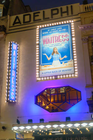 LONDON - OCTOBER 23, 2019: Night time view of the outside of The Adelphi Theatre on The Strand,...