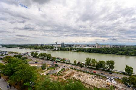 BRATISLAVA, SLOVAKIA - JULY 9, 2019: The Most SNP bridge across the River Danube as seen from Bratislava Castleのeditorial素材