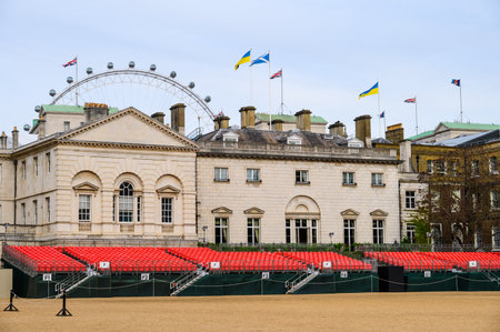 LONDON - May 18, 2022: Seating for Platinum Jubilee Trooping of The Colour celebrations at Horse Guards Parade with London Eye in the backgroundのeditorial素材
