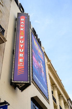 LONDON - May 18, 2022: Back to the Future, The Musical signs on the front of The Adelphi Theatre, Londonのeditorial素材