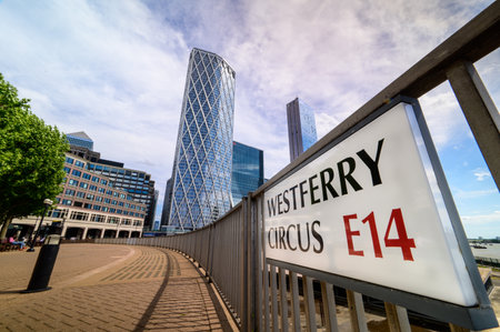 LONDON - May 17, 2022: Sign for Westferry Circus E14, Canary Wharf with skyscrapers in the backgroundのeditorial素材
