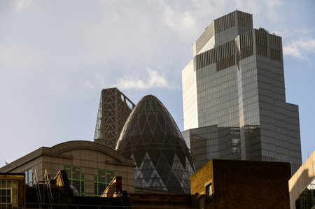 LONDON - November 2, 2020: Tops of skyscrapers including The Gherkin on a sunny day seen from Whitechapelのeditorial素材