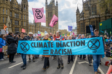 LONDON - April 22, 2023: XR's London kickoff: The climate protest in London commences outside the historic Houses of Parliament, symbolizing the beginning of significant environmental activism.のeditorial素材