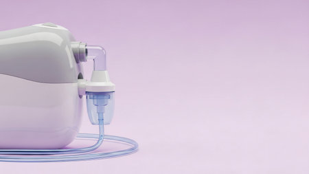 Close-up of a nebulizer used for respiratory therapy, set against a clean purple background, emphasizing healthcare and medical equipment.の写真素材