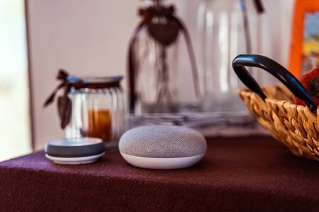 voice controlled smart speaker in a interior home environment. Smart AI speaker conceptの写真素材