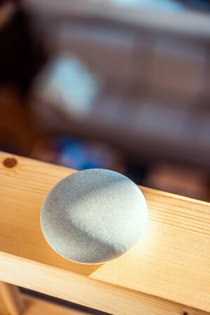 voice controlled smart speaker in a interior home environment. Smart AI speaker conceptの写真素材
