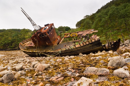 Fishing boat at rest falling into decayの写真素材