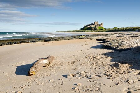 Bamburgh Castle and driftwood taken from the north beach dates back to the 6 7th centuryのeditorial素材