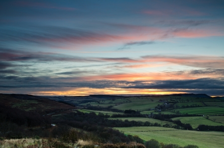 Sunset over Edlingham village and castle in Northumberland at the foothills of the Cheviotsの写真素材