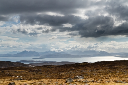 Blue mountains on the Isle of Skye viewed over Inner Sound from Wester Rossの写真素材