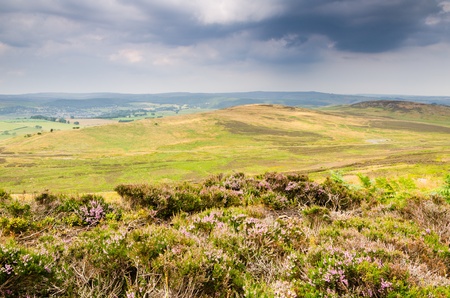 Lordenshaws ancient Hill Fort viewed from the Simonside Hills near Rothbury in Northumberland which are popular with walkers being rich in ancient heritage and mysteryの写真素材