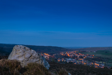 Rothbury Town at dusk in the Coquet Valley Northumberland viewed from the Rothbury Terracesの写真素材