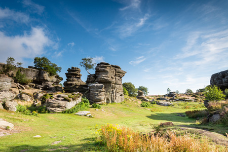 Brimham Rocks on a sunny day - Brimham Rocks on Brimham Moor in North Yorkshire are weathered sandstone, known as Millstone Grit,creating some dramatic shapes, many of which have been namedの写真素材